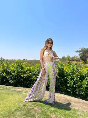 Deepika Ghose Geometric Printed Bralet with Hand Embroidered Straps and Center Ring detailing and Geometric Printed Flared Pants with Rivet Detailing from Magical Wilderness Collection