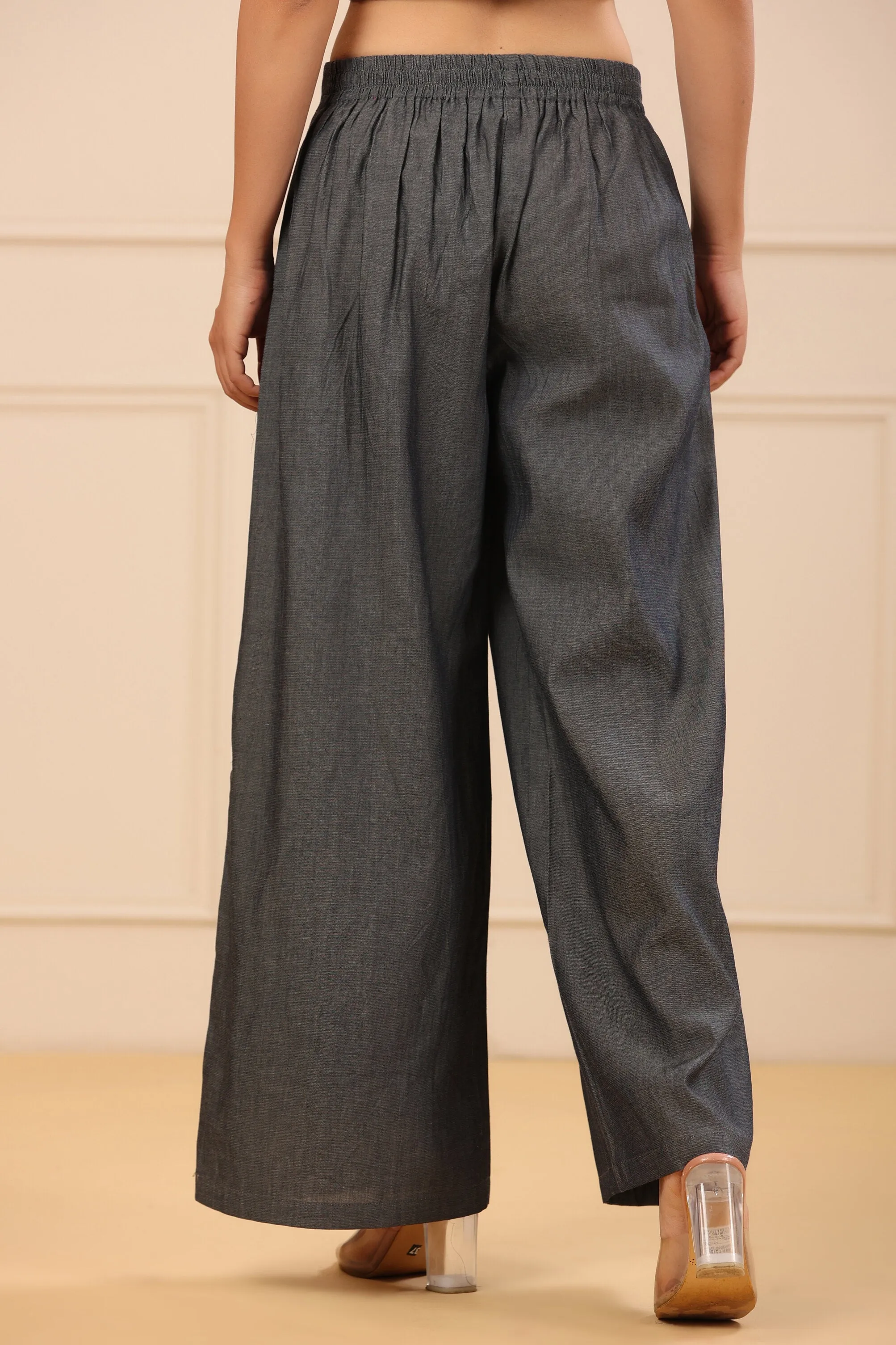 Jashvi Grey Solid Denim Flared Palazzos with a Button Closure & Partially Elasticated Waistband